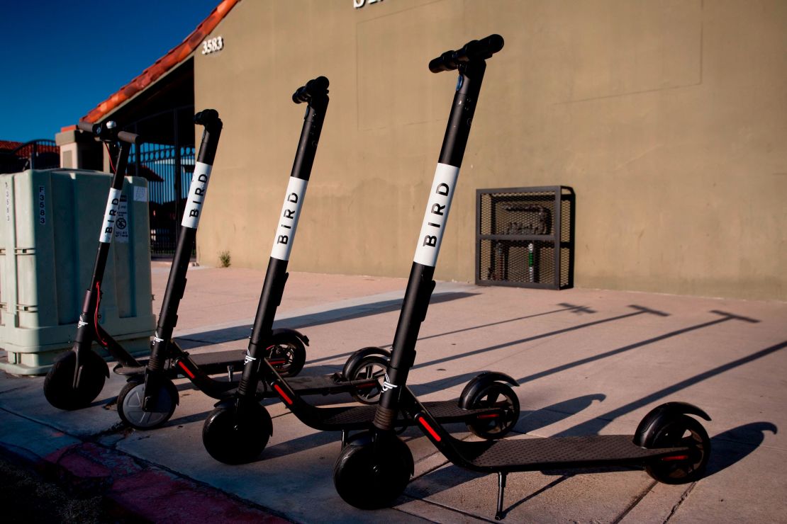 Dockless electric scooters operated by scooter-share company Bird, parked on a sidewalk in San Diego's North Park, in August 2018. 