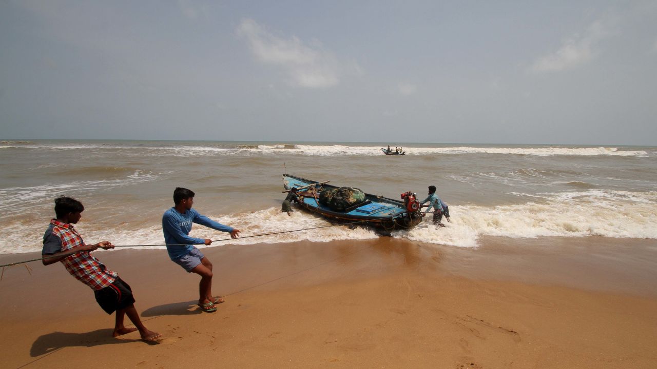 Fishing boats at Konark Beach prepare this week for Tropical Cyclone Fani in eastern India's Odisha.