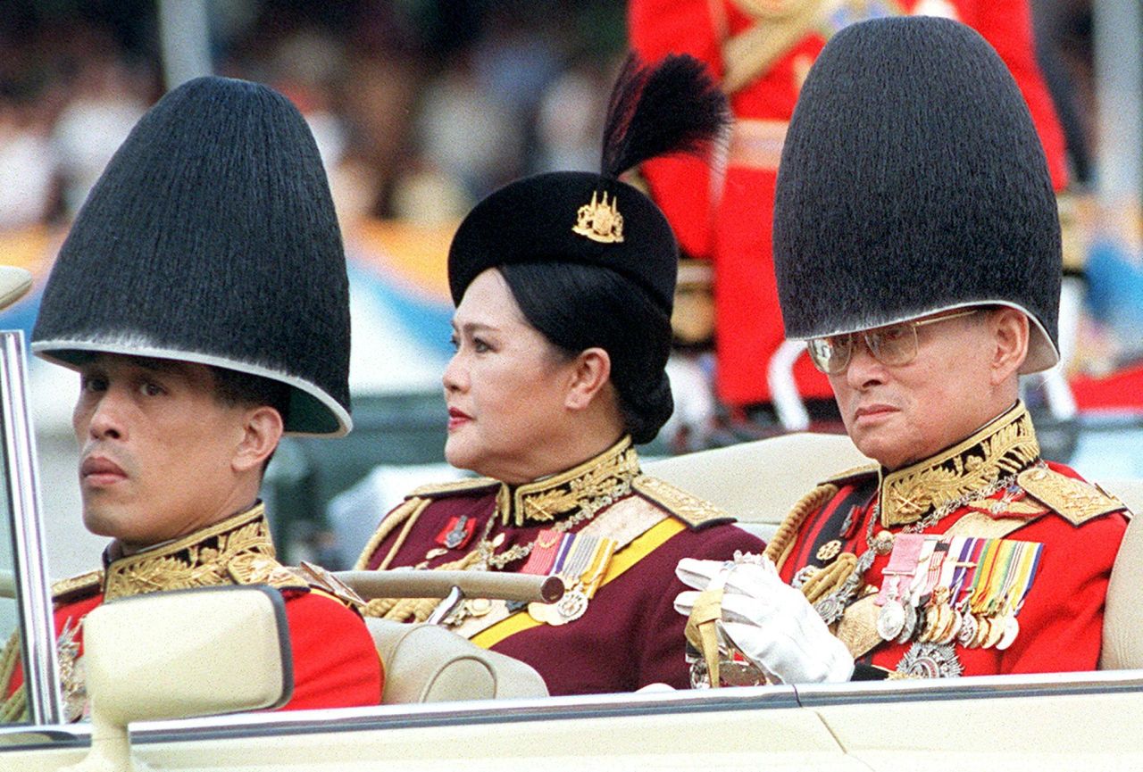 Vajiralongkorn and his parents are seen together in Bangkok in 2000.