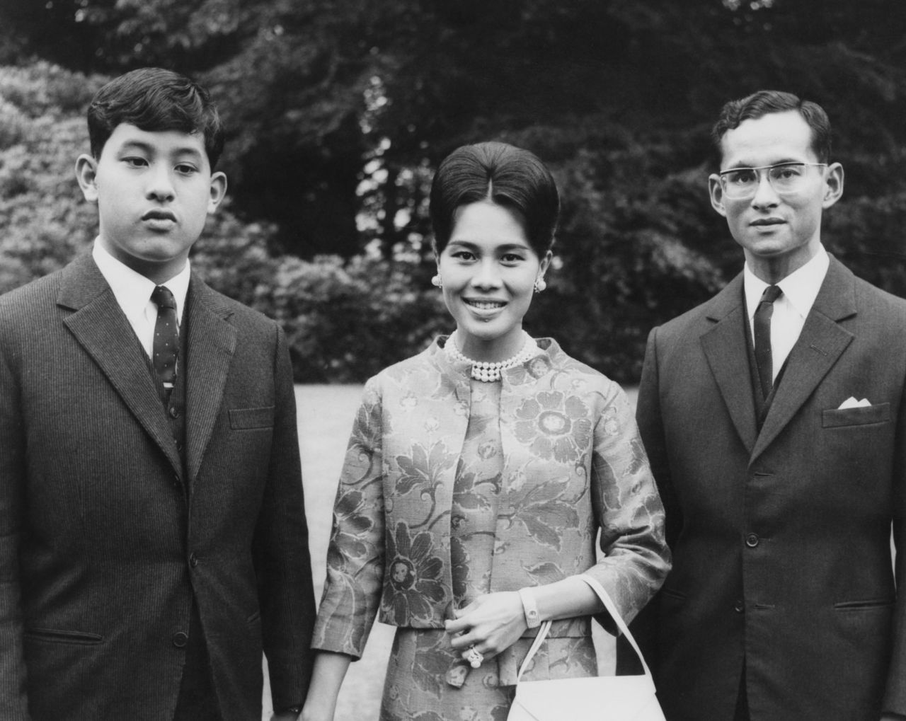 Vajiralongkorn and his parents take a photo at their private residence in Sunninghill, England, in 1966.