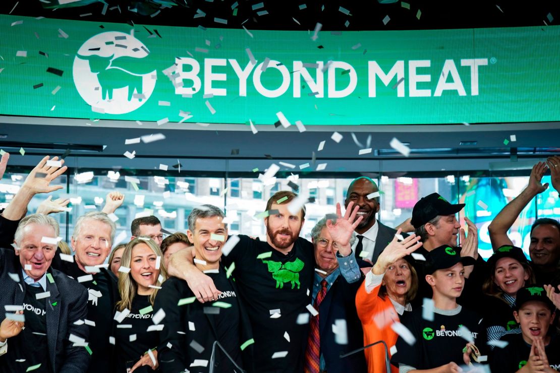 Beyond Meat CEO Ethan Brown  celebrates with guests after ringing the opening bell at Nasdaq in New York.