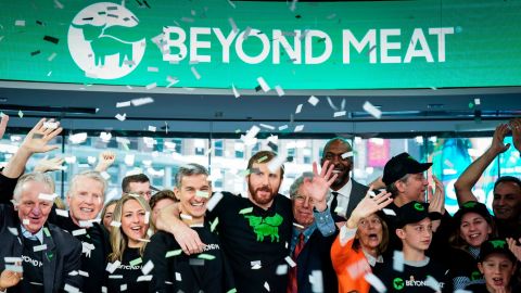 Beyond Meat CEO Ethan Brown  celebrates with guests after ringing the opening bell at Nasdaq in New York.