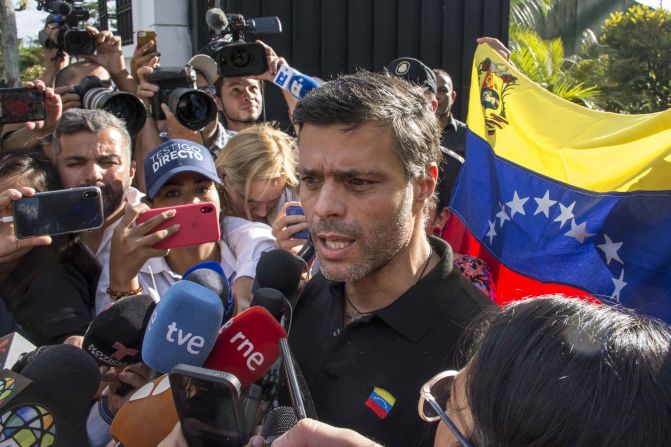 Opposition activist Leopoldo Lopez <a href="index.php?page=&url=https%3A%2F%2Fedition.cnn.com%2F2019%2F05%2F03%2Famericas%2Fvenezuela-lopez-opposition-intl%2Findex.html" target="_blank">speaks to the media</a> at the gate of the Spanish ambassador's residence in Caracas on May 2. Lopez is meant to be on house arrest, but he said on Twitter that he was released by the military. He and his family have been received as guests by Spanish Ambassador Jesús Silva Fernández following his release.