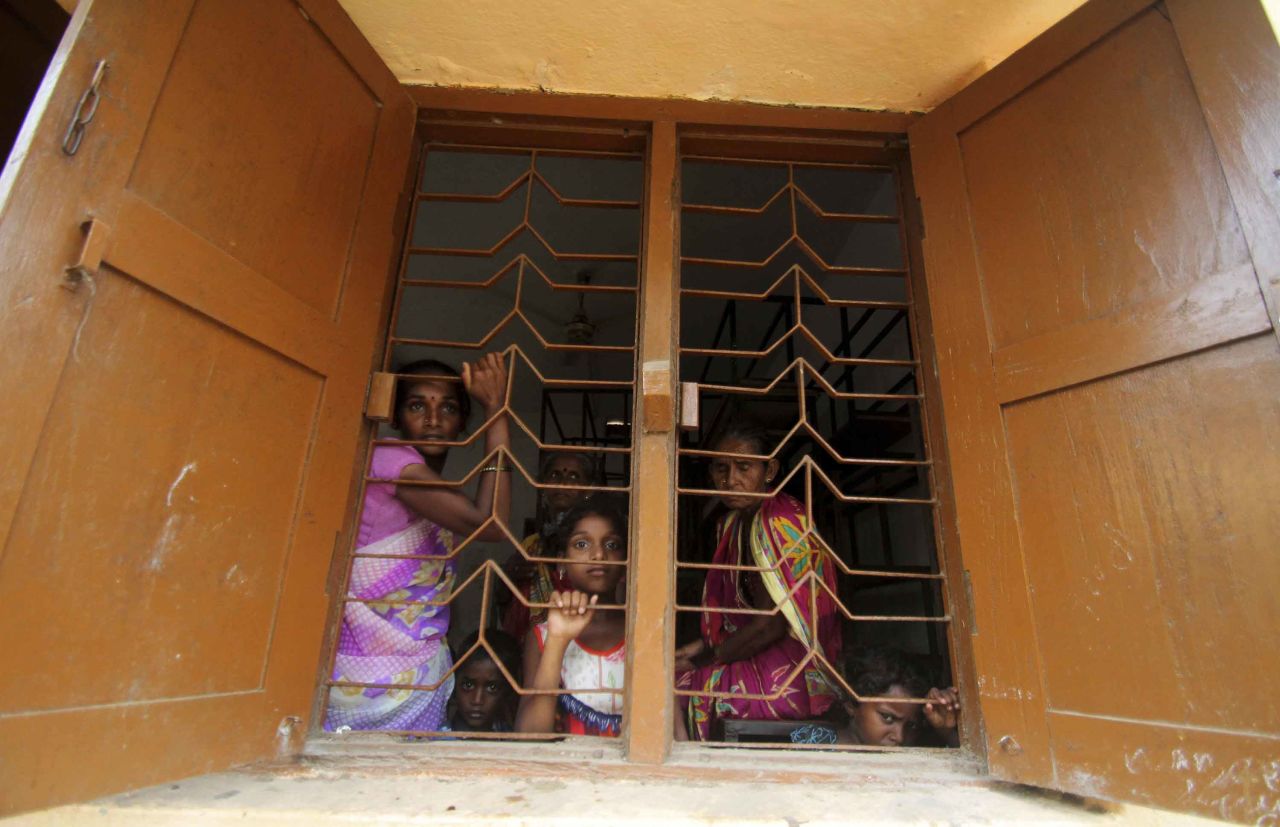 Villagers from Chandrabhaga take shelter at a school on May 2.