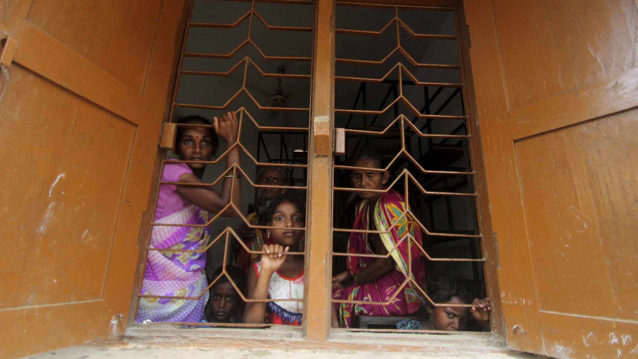 Villagers from Chandrabhaga take shelter at a school on May 2.