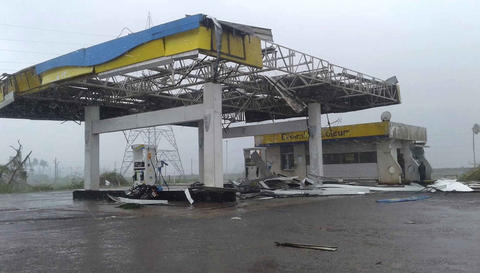 The storm left this gas station damaged outside Puri.