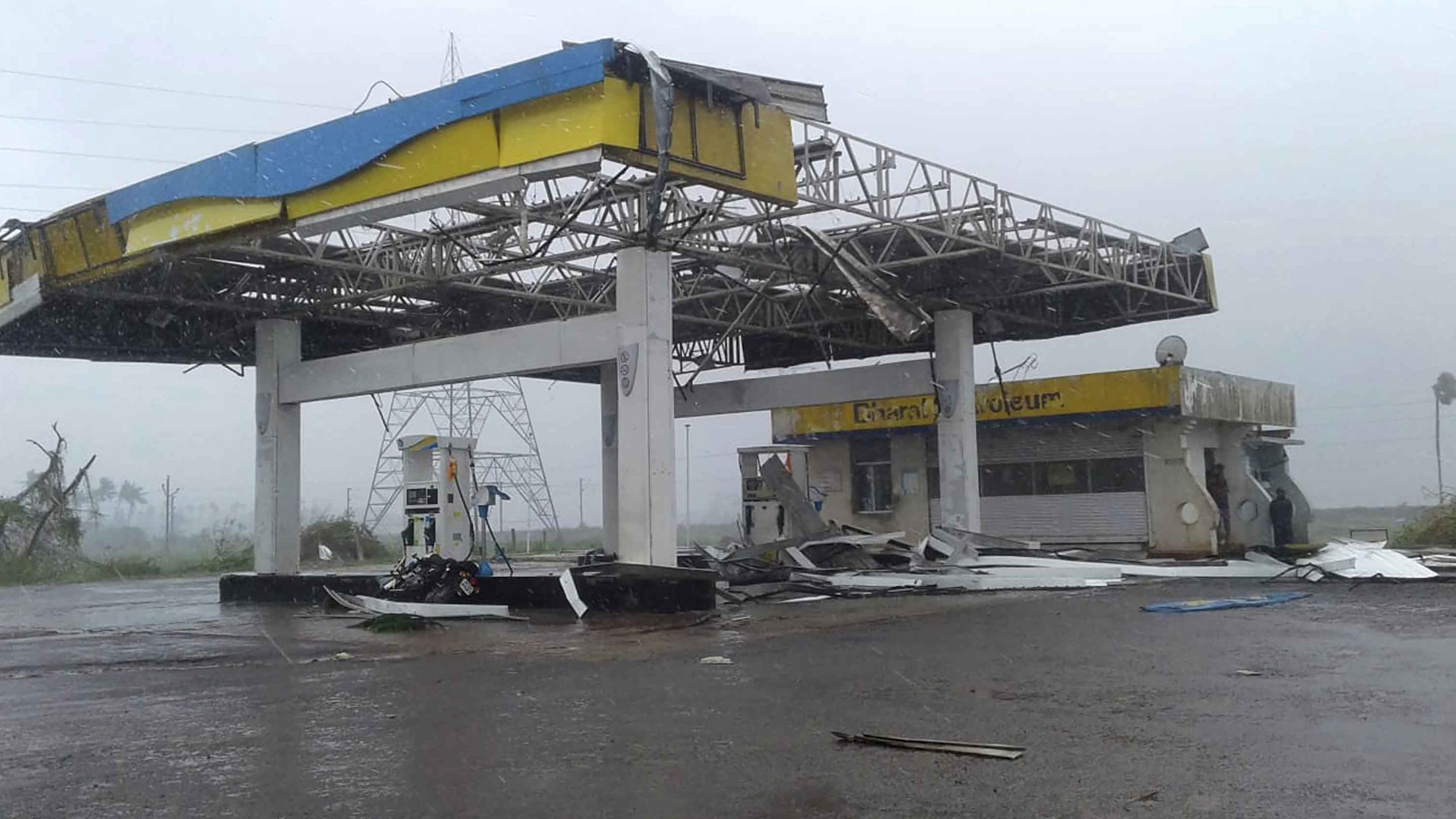 The storm left this gas station damaged outside Puri.