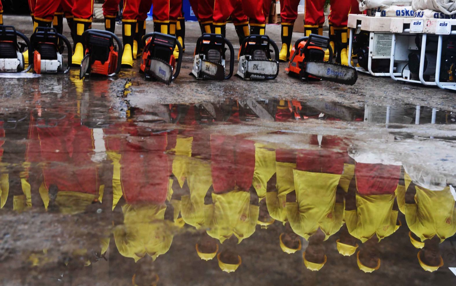 Firefighters in Puri stand in front of chainsaws as they prepare for the storm on May 2.