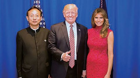 Shandong Buchang Pharmaceuticals Chairman Zhao Tao with Donald and Melania Trump in 2017.