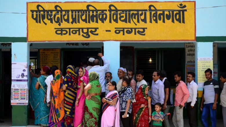 Indian voters stand in a queue to cast their vote at a polling station, in Kanpur on April 29, 2019. - Voting began for the fourth phase of India's general parliamentary elections as Indians exercise their franchise in the country's marathon election which started on April 11 and runs through to May 19 with the results to be declared on May 23. (Photo by SANJAY KANOJIA / AFP)        (Photo credit should read SANJAY KANOJIA/AFP/Getty Images)