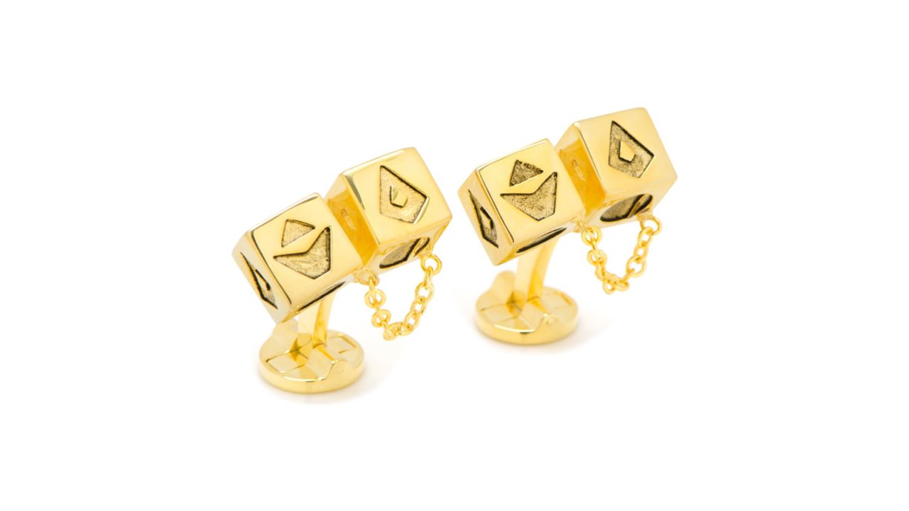 <strong>Star Wars Dice 3D Cufflinks ($135: </strong><a href="https://click.linksynergy.com/deeplink?id=Fr/49/7rhGg&mid=1237&u1=0503starwarsday&murl=https%3A%2F%2Fshop.nordstrom.com%2Fs%2Fcufflinks-inc-3d-star-wars-dice-cuff-links%2F5139132%3Forigin%3Dkeywordsearch-personalizedsort%26breadcrumb%3DHome%252FAll%2520Results%26color%3Dgold" target="_blank" target="_blank"><strong>nordstrom.com</strong></a><strong>)</strong><br />