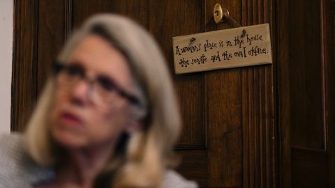 Miller has a sign hanging in her office that says, "A woman's place is in the House, the Senate and the Oval Office."