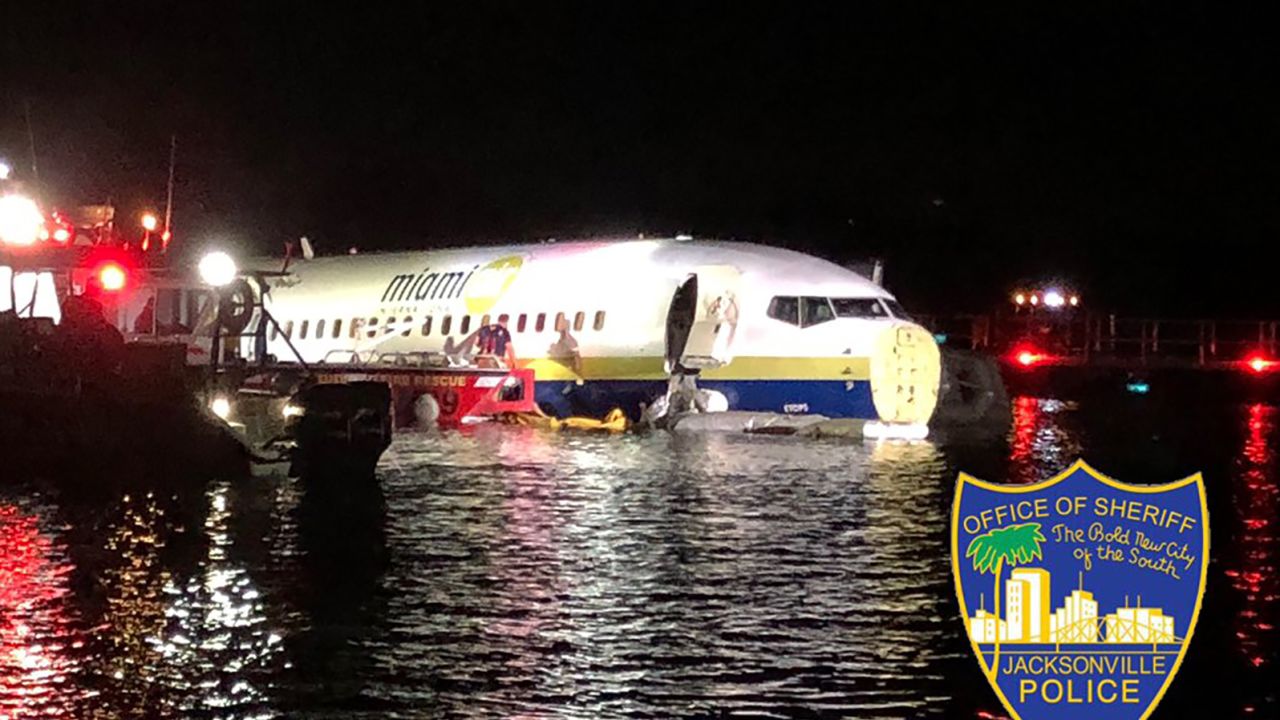 First responders helped passengers escape from the aircraft Friday night.