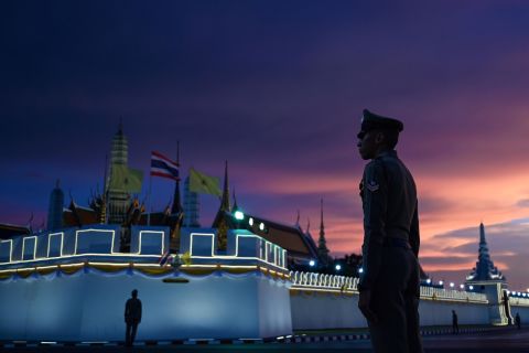 Royal Thai police stand guard near the Grand Palace in Bangkok on Friday, May 3, ahead of King Maha Vajiralongkorn's coronation.