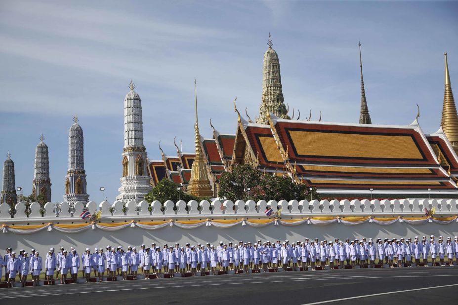 Thai officials stand outside the Grand Palace in Bangkok on May 4.