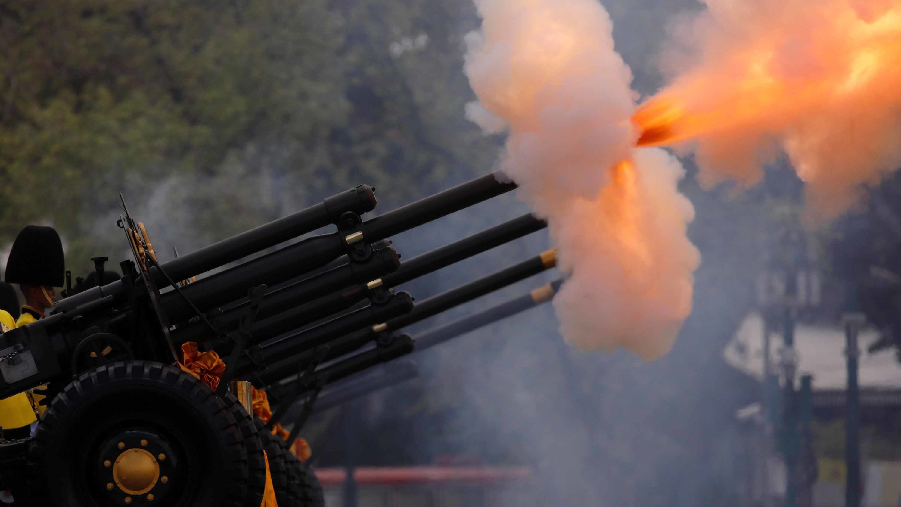 Thai Royal Guards fire a series of cannon salutes during the coronation in Bangkok on May 4.
