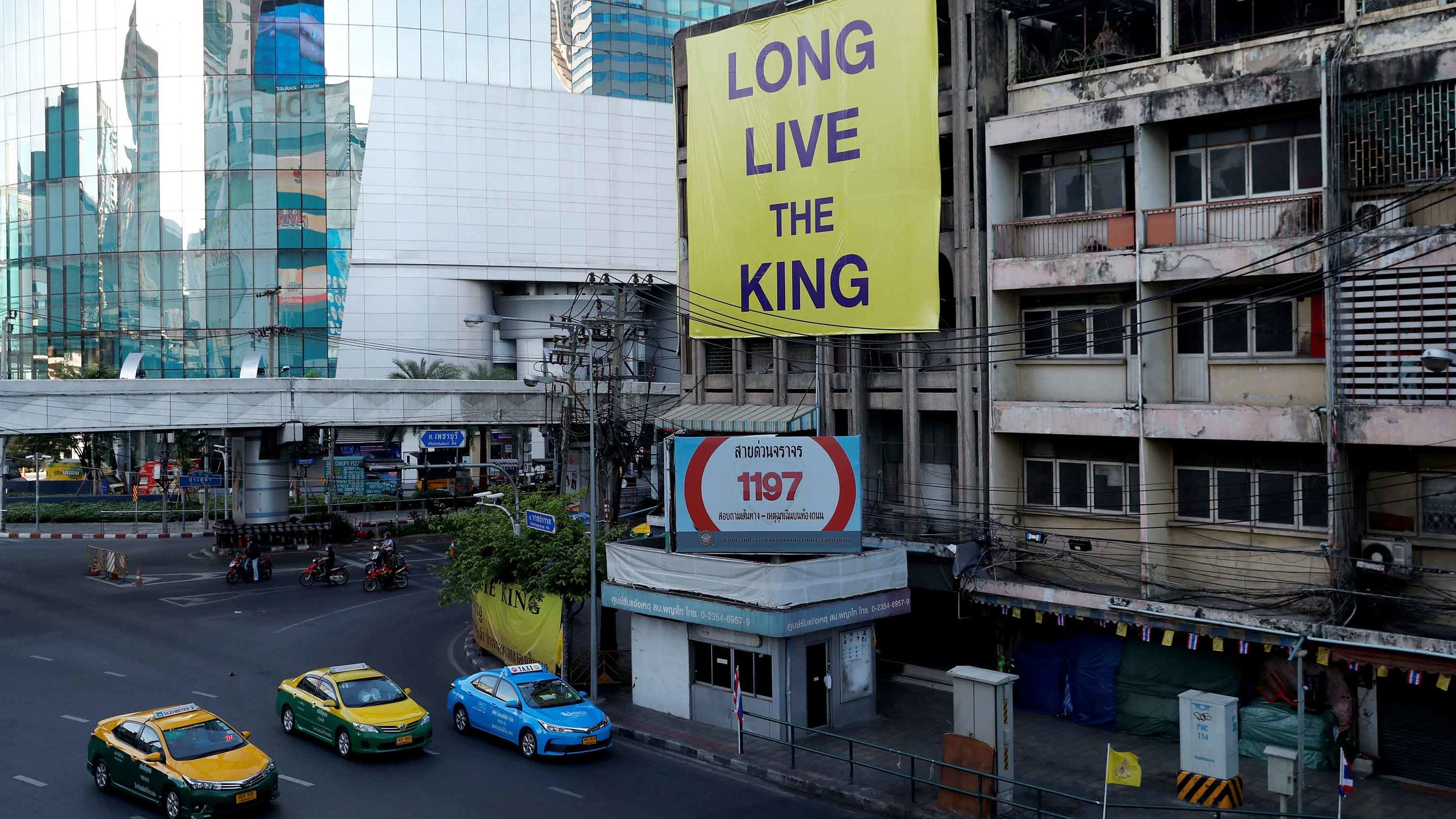 A banner is seen on a street during the coronation of King Maha Vajiralongkorn.