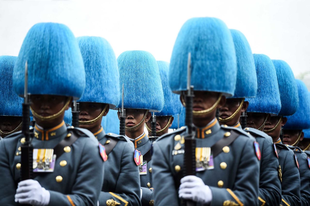 Thai Royal Guards march along a street near the Grand Palace during the coronation of the Thai King on Saturday, May 4.