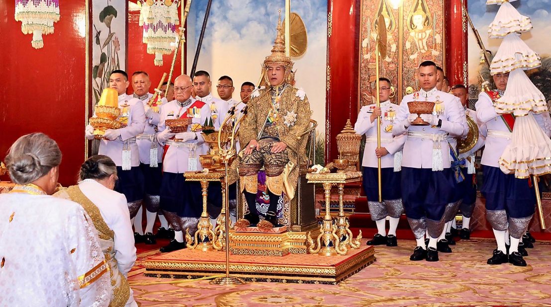 The chief brahmin prays before Thai King Maha Vajiralongkorn Bodindradebayavarangkun after all royal regalia items have been presented to him during his coronation ceremony at the Grand Palace in Bangkok on May 4.