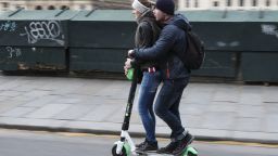People use an Lime-S electric scooter of the US company Lime in Paris on March 3, 2019 in Paris. (Photo by KENZO TRIBOUILLARD / AFP)        (Photo credit should read KENZO TRIBOUILLARD/AFP/Getty Images)