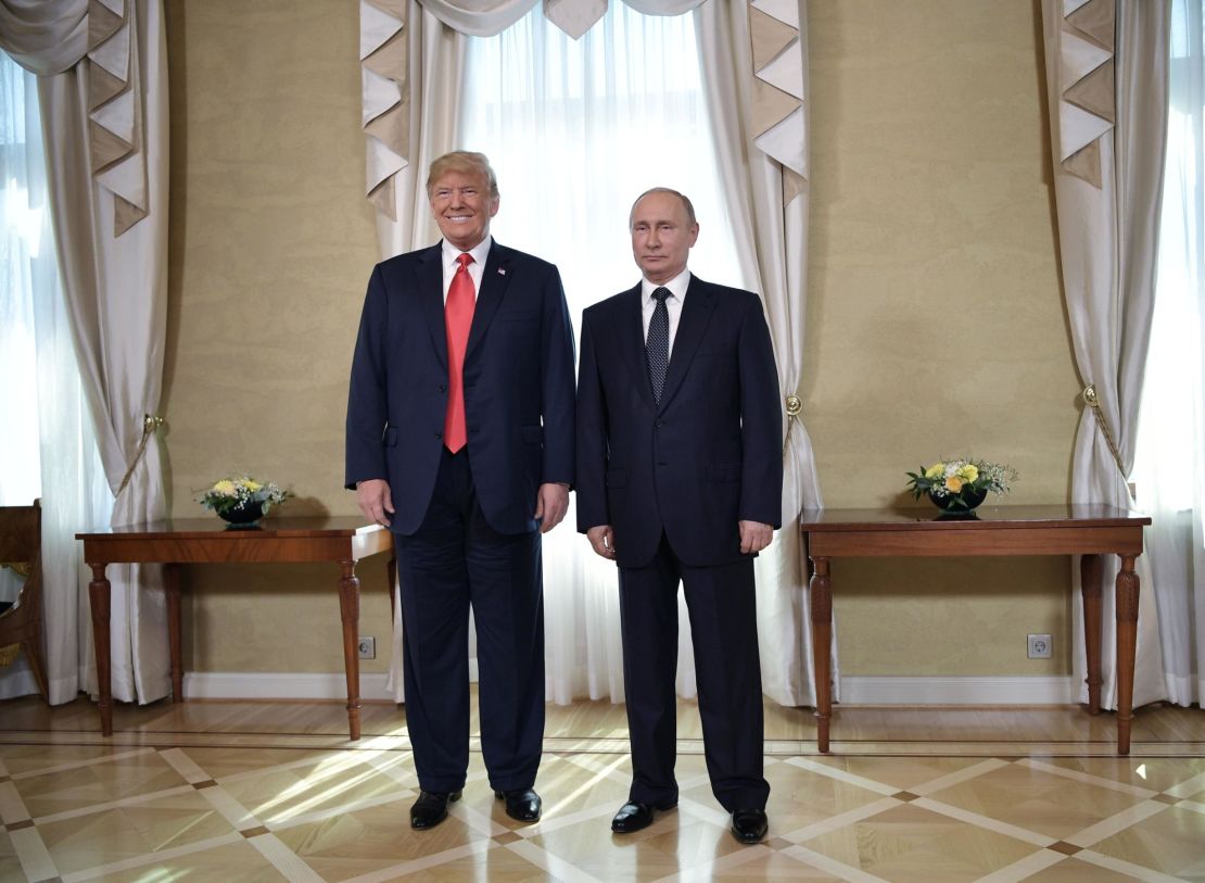US President Donald Trump (left) and Russian President Vladimir Putin pose ahead a meeting in Helsinki, July 2018.