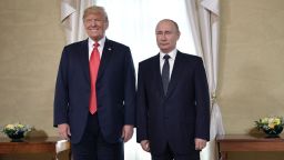US President Donald Trump (L) and Russia's President Vladimir Putin pose ahead a meeting in Helsinki, on July 16, 2018. - The US and Russian leaders opened an historic summit in Helsinki, with Donald Trump promising an "extraordinary relationship" and Vladimir Putin saying it was high time to thrash out disputes around the world. (Photo by Alexey NIKOLSKY / Sputnik / AFP)        (Photo credit should read ALEXEY NIKOLSKY/AFP/Getty Images)