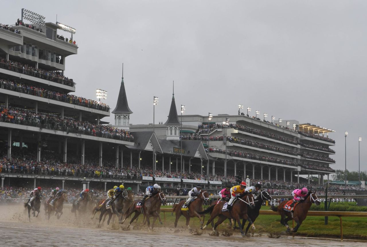 Luis Saez riding Maximum Security takes the lead heading into the first turn during the 145th running of the Kentucky Derby at Churchill Downs. Maximum Security crossed the finish line first but after was disqualified because of a foul on the track.