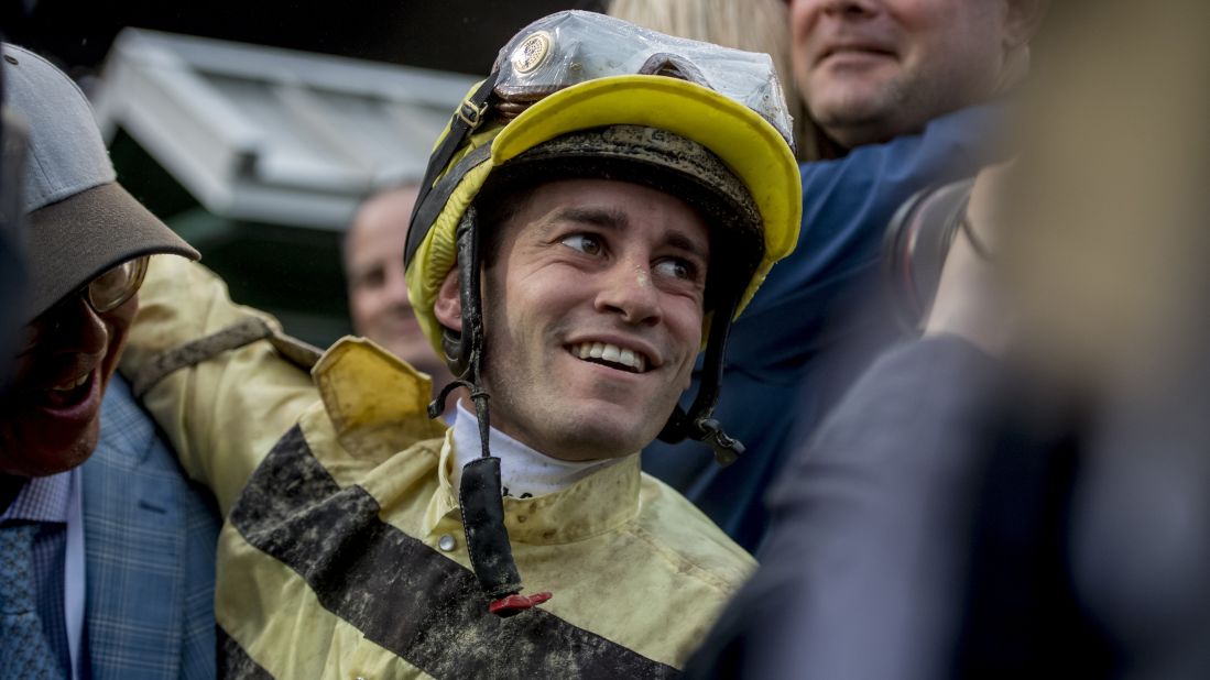 Flavien Prat, jockey of #20 Country House, celebrates after winning the 145th Kentucky Derby at Churchill Downs on May 4. Country House was declared the winner after pre-race favorite Maximum Security was disqualified.