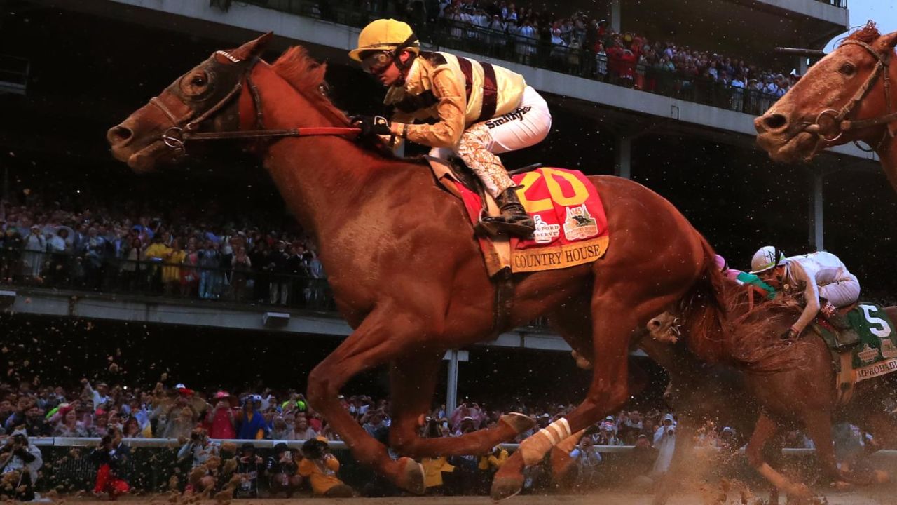 LOUISVILLE, KENTUCKY - MAY 04: Country House #20, ridden by jockey Flavien Prat, crosses the finish line to win the 145th running of the Kentucky Derby at Churchill Downs on May 04, 2019 in Louisville, Kentucky. Country House #20 was declared the winner after a stewards review disqualified Maximum Security #7. (Photo by Rob Carr/Getty Images)