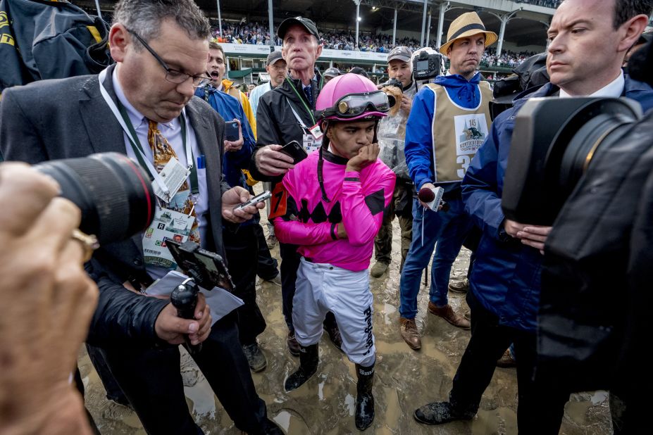 Luis Saez, jockey of Maximum Security, reacts after learning of his disqualification. 
