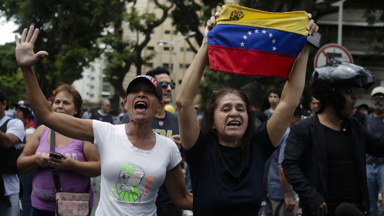 Guaidó's supporters shout slogans at a demonstration in Caracas on May 4.