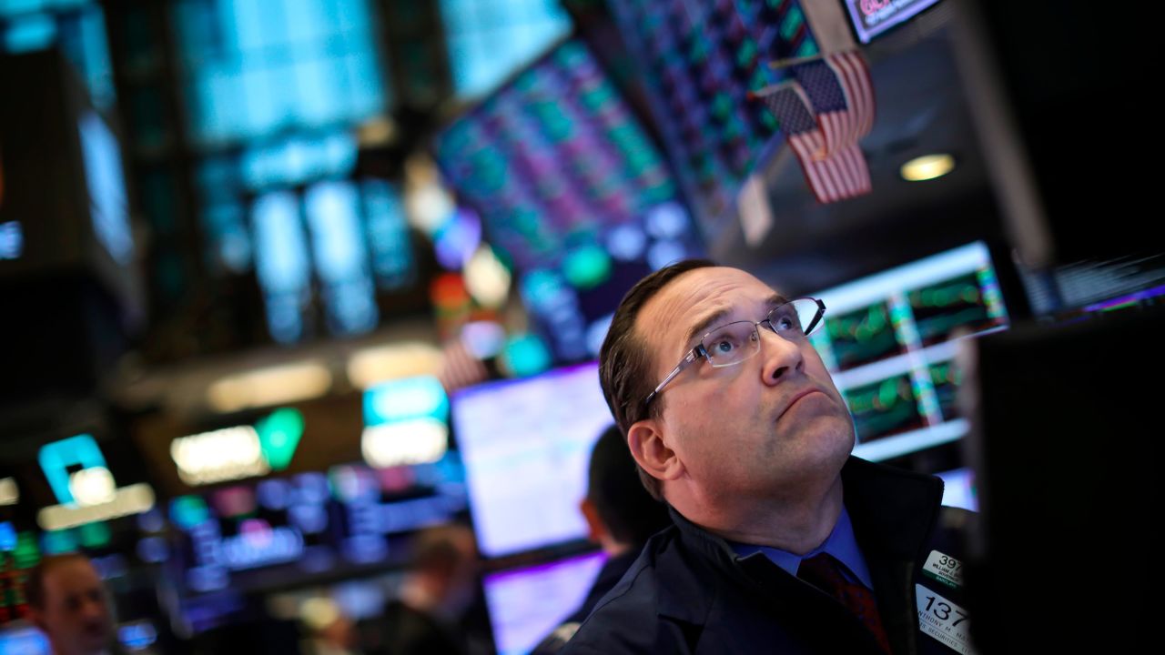 NEW YORK, NY - MAY 1:  A trader works at his desk on the floor of the New York Stock Exchange (NYSE) ahead of the closing bell, May 1, 2019 in New York City. Following the Federal Reserve's announcement that interest rates will remain unchanged, the Dow Jones Industrial was own 162 points at the close of the trading session on Wednesday. (Photo by Drew Angerer/Getty Images)