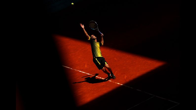 Albert Ramos-Vinolas of Spain serves to Taro Daniel of Japan during day one of the Mutua Madrid Open at La Caja Magica on Saturday, May 4, in Madrid.