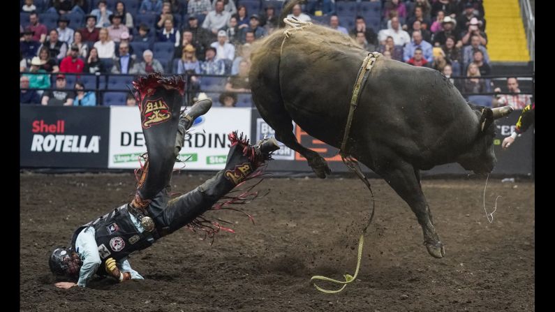 Riley Gagnon of Canada is bucked off of his bull Night Shift during the PBR Monster Energy Tour on Saturday, May 4, in Quebec City, Canada.