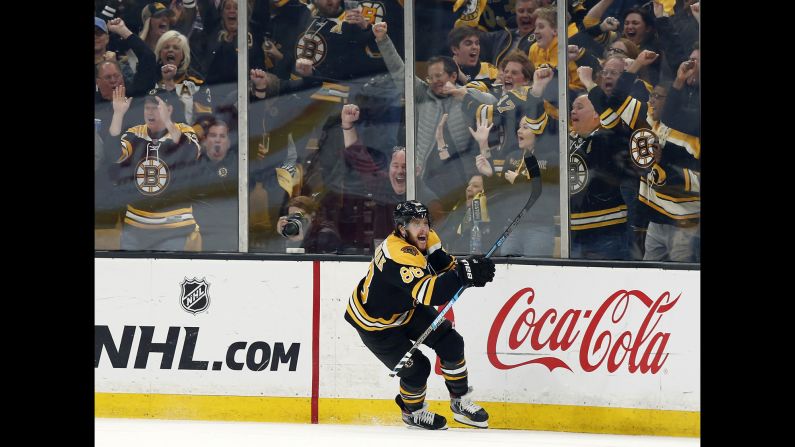 Boston Bruins right wing David Pastrnak celebrates after scoring the game-winning goal against the Columbus Blue Jackets during game five of the second round of the 2019 Stanley Cup Playoffs at TD Garden in Boston, Massachusetts.