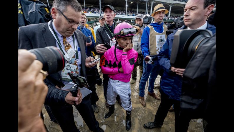 Luis Saez, jockey of Maximum Security, reacts after learning of his horse's disqualification at the 145th running of the Kentucky Derby at Churchill downs on Saturday, May 4. Maximum Security was disqualified for a foul on the track, the first disqualification of its kind at the Derby. <a href="index.php?page=&url=https%3A%2F%2Fwww.cnn.com%2F2019%2F05%2F04%2Fsport%2Fgallery%2Fkentucky-derby-2019%2Findex.html" target="_blank">See more photos from the Kentucky Derby</a>