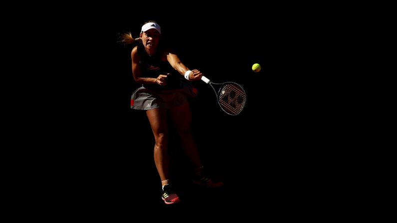 Angelique Kerber of Germany serves to Lesia Tsurenko of Ukraine during day two of the Mutua Madrid Open at La Caja Magica on Sunday, May 5 in Madrid.