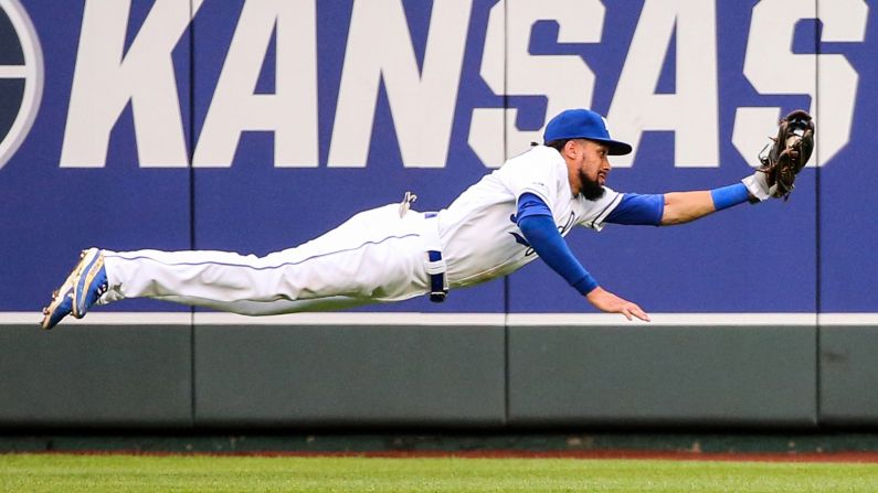 Kansas City Royals center fielder Billy Hamilton dives for a catch during the eighth inning in a game against the Tampa Bay Rays at Kauffman Stadium on May 1 in Kansas City, Missouri.