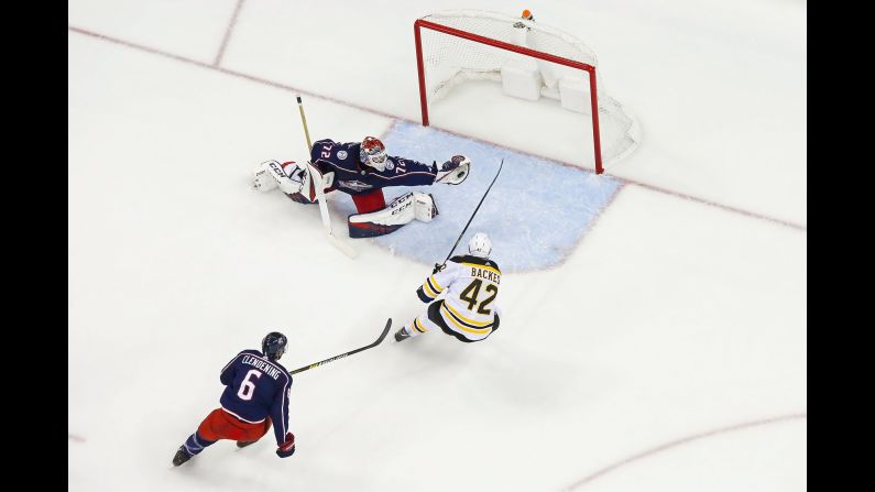 Columbus Blue Jackets goaltender Sergei Bobrovsky stops a shot from Boston Bruins' David Backes during Game Four of the second round of the 2019 NHL Stanley Cup Playoffs on Thursday, May 2, in Columbus, Ohio. Boston defeated Columbus 4-1.
