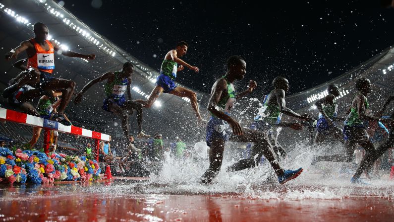 Athletes compete in the Men's 3,000-meter Steeplechase during the IAAF Diamond League event at the Khalifa International Stadium on Friday, May 3, in Doha, Qatar.