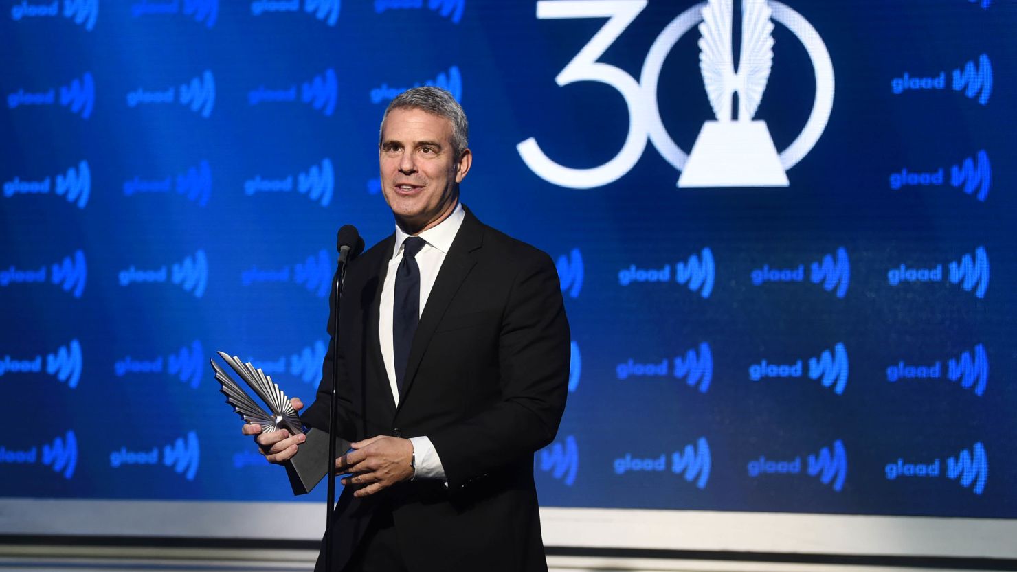 Andy Cohen accepts an award onstage during the 30th Annual GLAAD Media Awards New York 