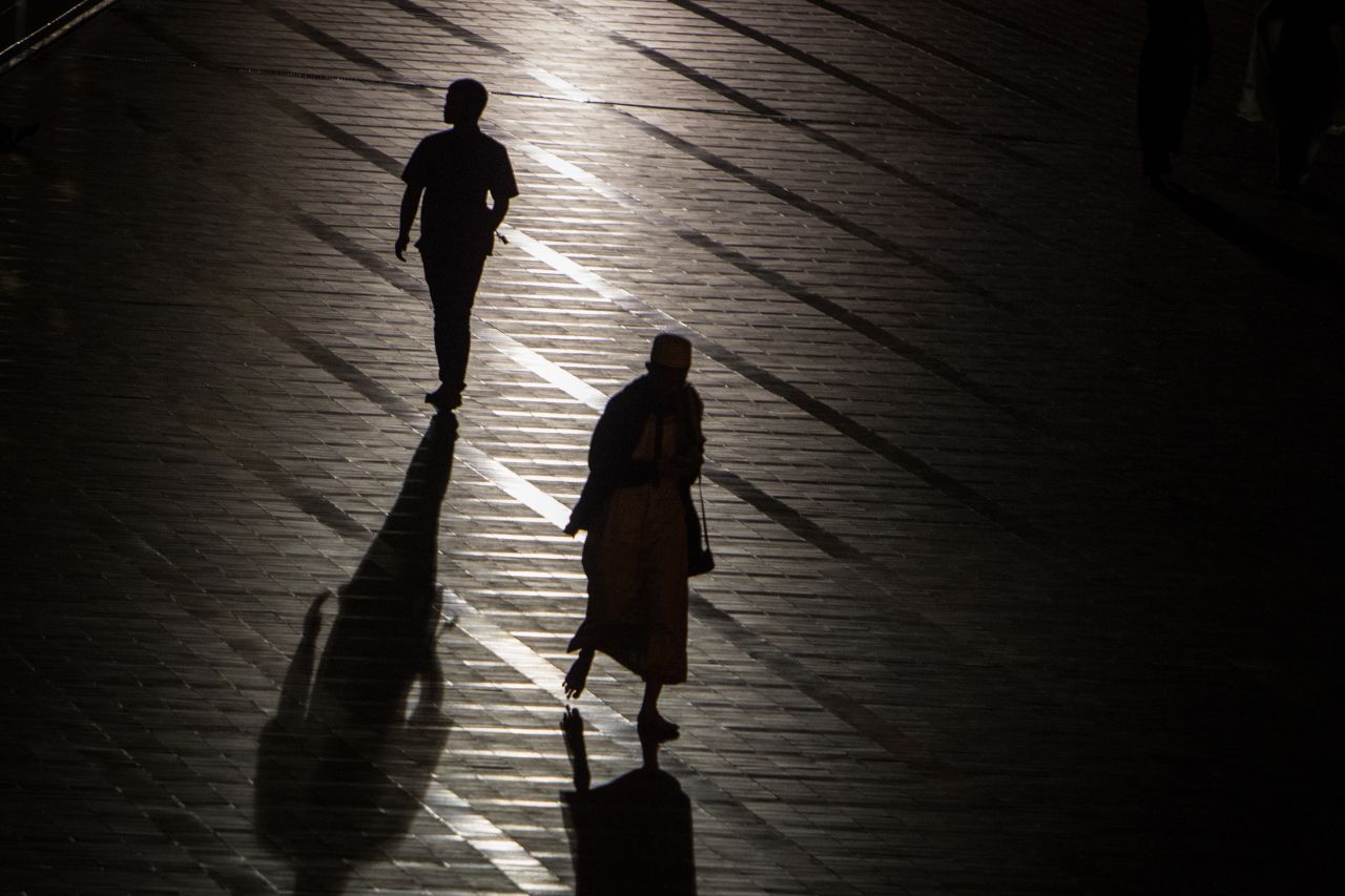 Indonesian Muslims silhouetted going to mosque before an evening prayer called Tarawih, the night before the start of the holy month of Ramadan, at Istiqlal mosque in Jakarta, Indonesia, on May 5.
