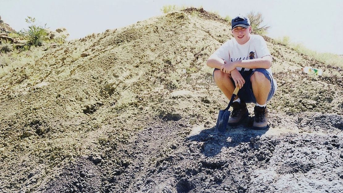 Sterling Nesbitt at age 16 with the fossil he found.