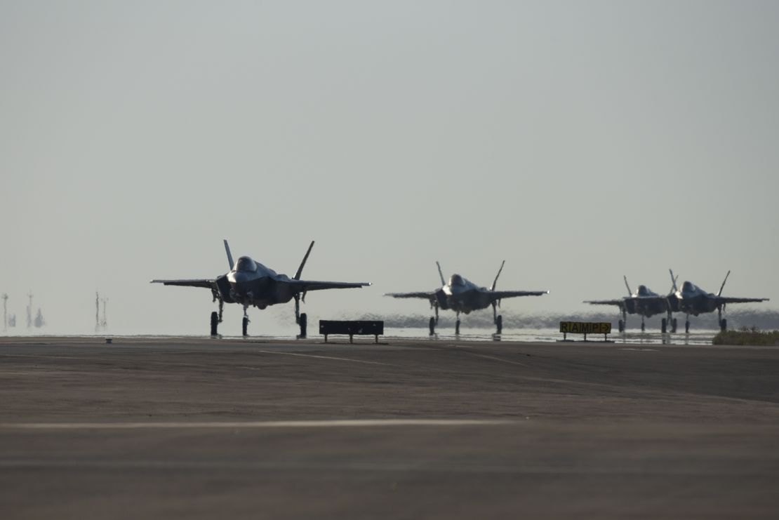 Four US Air Force F-35As taxi after landing at Al Dhafra Air Base, United Arab Emirates, on April 15, 2019.