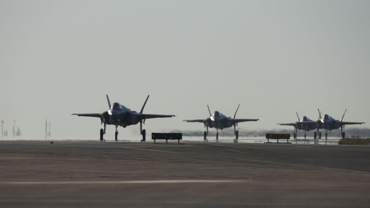 Four F-35A Lightning IIs assigned to the 4th Expeditionary Fighter Squadron taxi after landing at Al Dhafra Air Base, United Arab Emirates, April 15, 2019.