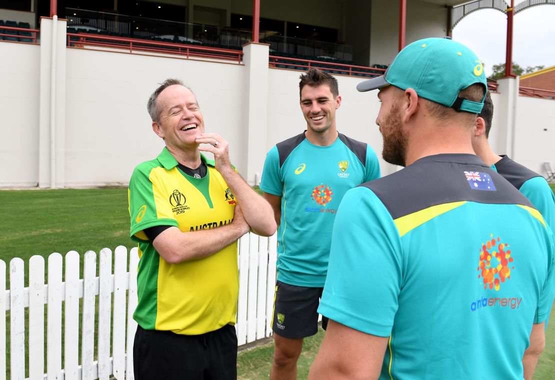 Labor Opposition leader Bill Shorten shares a laugh with Australian Cricket players Aaron Finch and Pat Cummins during a Cricket Australia Media Opportunity at Allan Border Field on May 4, 2019 in Brisbane, Australia. 