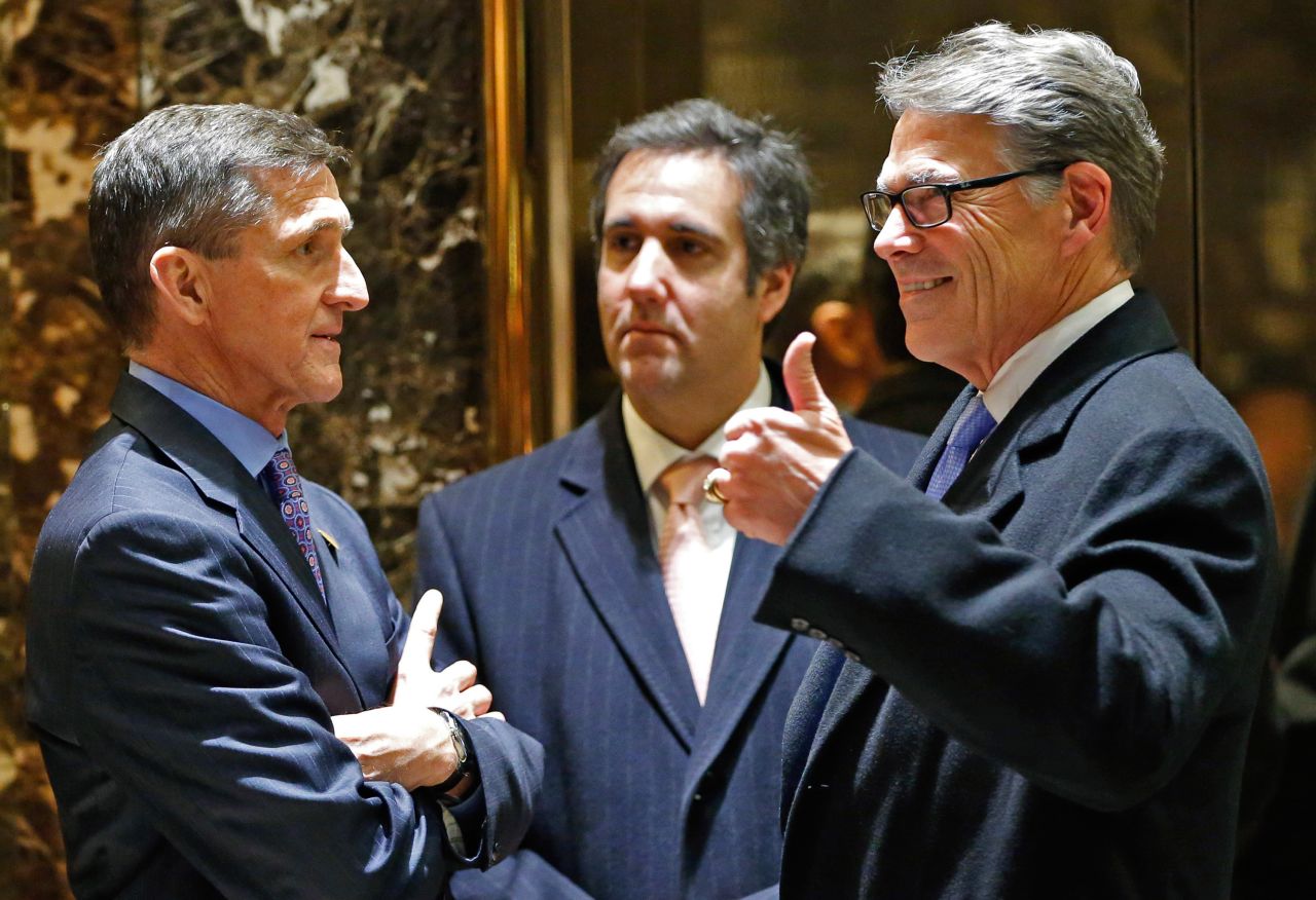 Cohen, center, chats with retired Army Lt. Gen. Michael Flynn, left, and former Texas Gov. Rick Perry in the Trump Tower lobby in New York in December 2016. Flynn went on to become Trump's national security adviser before resigning and pleading guilty to "willfully and knowingly" making "false, fictitious and fraudulent statements" to the FBI regarding discussions with Russian Ambassador Sergey Kislyak. Perry became secretary of the US Department of Energy.