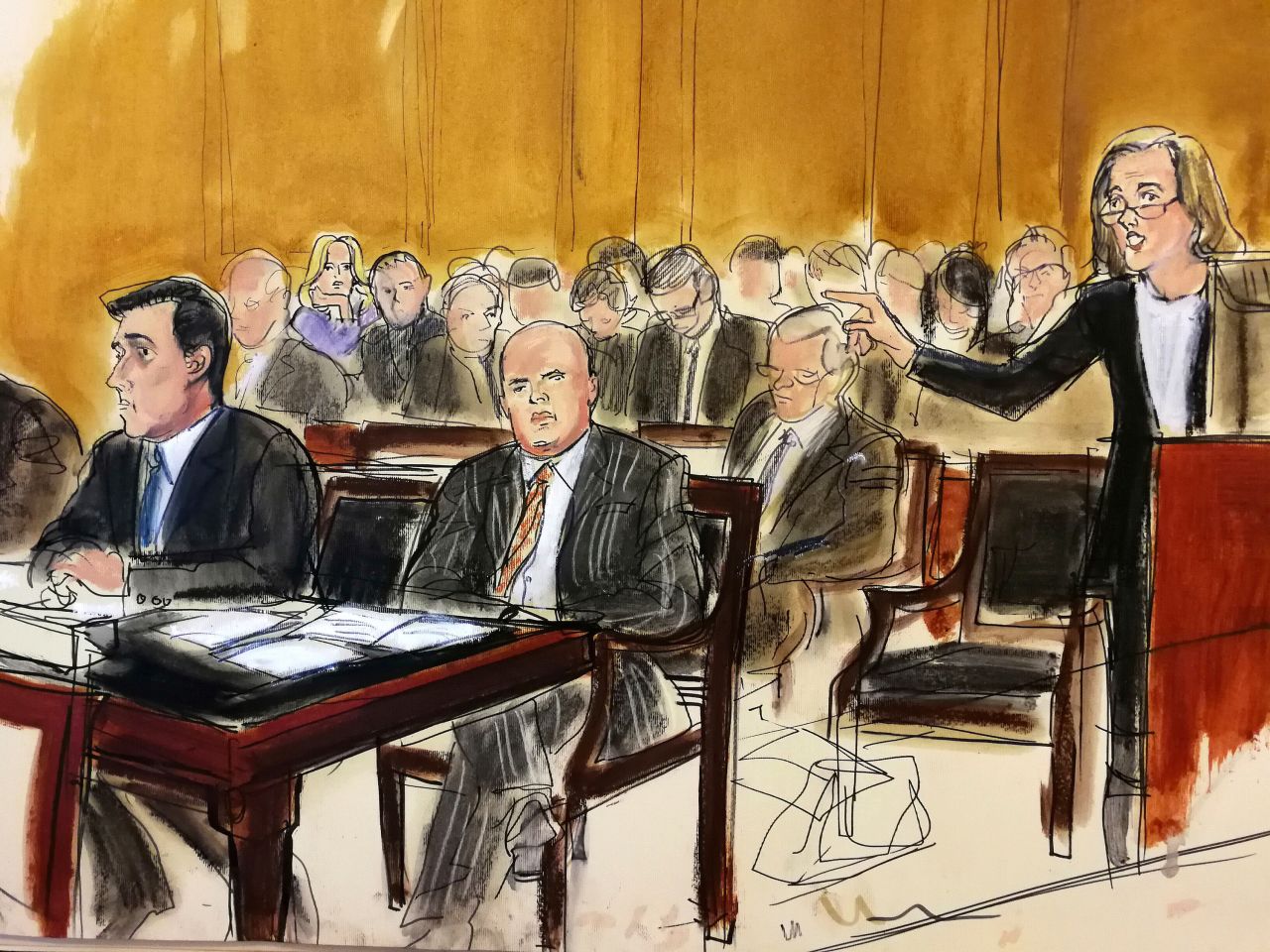 In this courtroom sketch, Trump lawyer Joanna Hendon speaks at a federal court hearing as Cohen sits next to one of his own attorneys in April 2018.