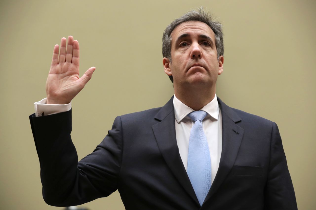 Cohen is sworn in before<a href="http://www.cnn.com/2019/02/27/politics/gallery/michael-cohen-testimony/index.html" target="_blank"> testifying to the House Oversight Committee</a> in February 2019. In his stunning opening statement, Cohen called Trump a racist, a con man and a cheat and he detailed a wide range of allegations against his ex-boss.