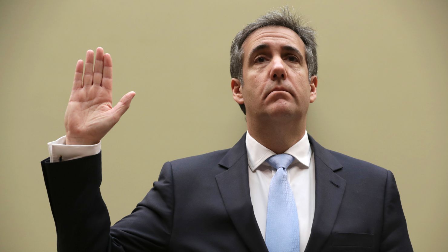 In this February 27, 2019, file photo, Michael Cohen is sworn in before testifying before the House Oversight Committee on Capitol Hill  in Washington.